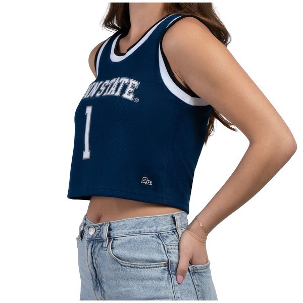 side view of model wearing women's navy cropped basketball jersey with Penn State and #1